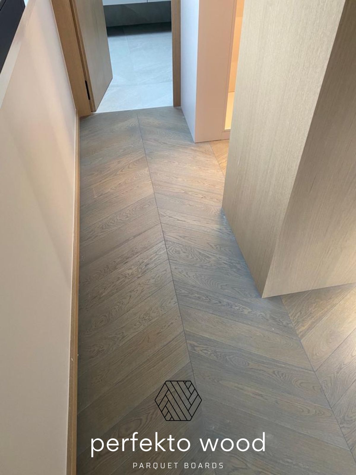 Chevron oak parquet 45° luxury apartment Geneva Switzerland — Select grade unfinished PerfektoWood