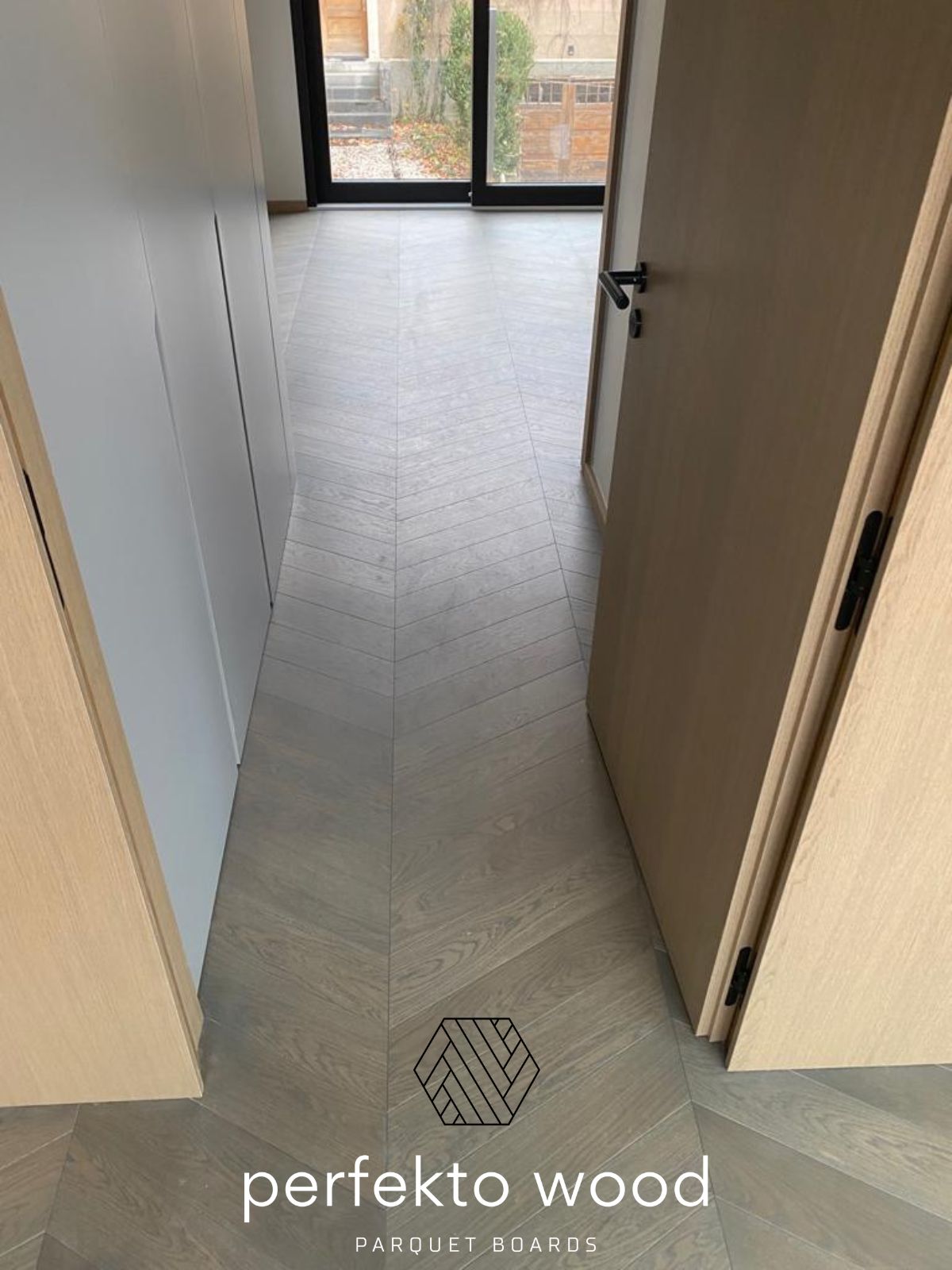 Premium chevron parquet 45° Geneva apartment — European oak manufacturer Lithuania PerfektoWood